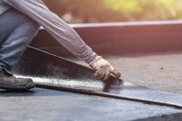Professional Basement Waterproofing technician working in North Greece, NY